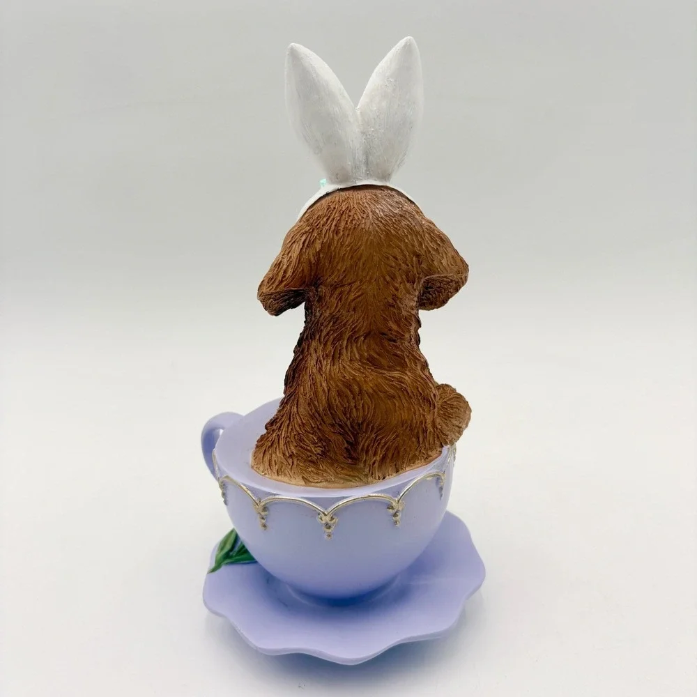 Easter Puppy in Teacup Figurine Bunny Ears Butterfly Lavender Resin Pastel‎